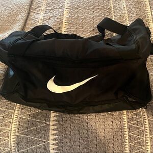 Nike Classic Black Duffel Bag with White Logo